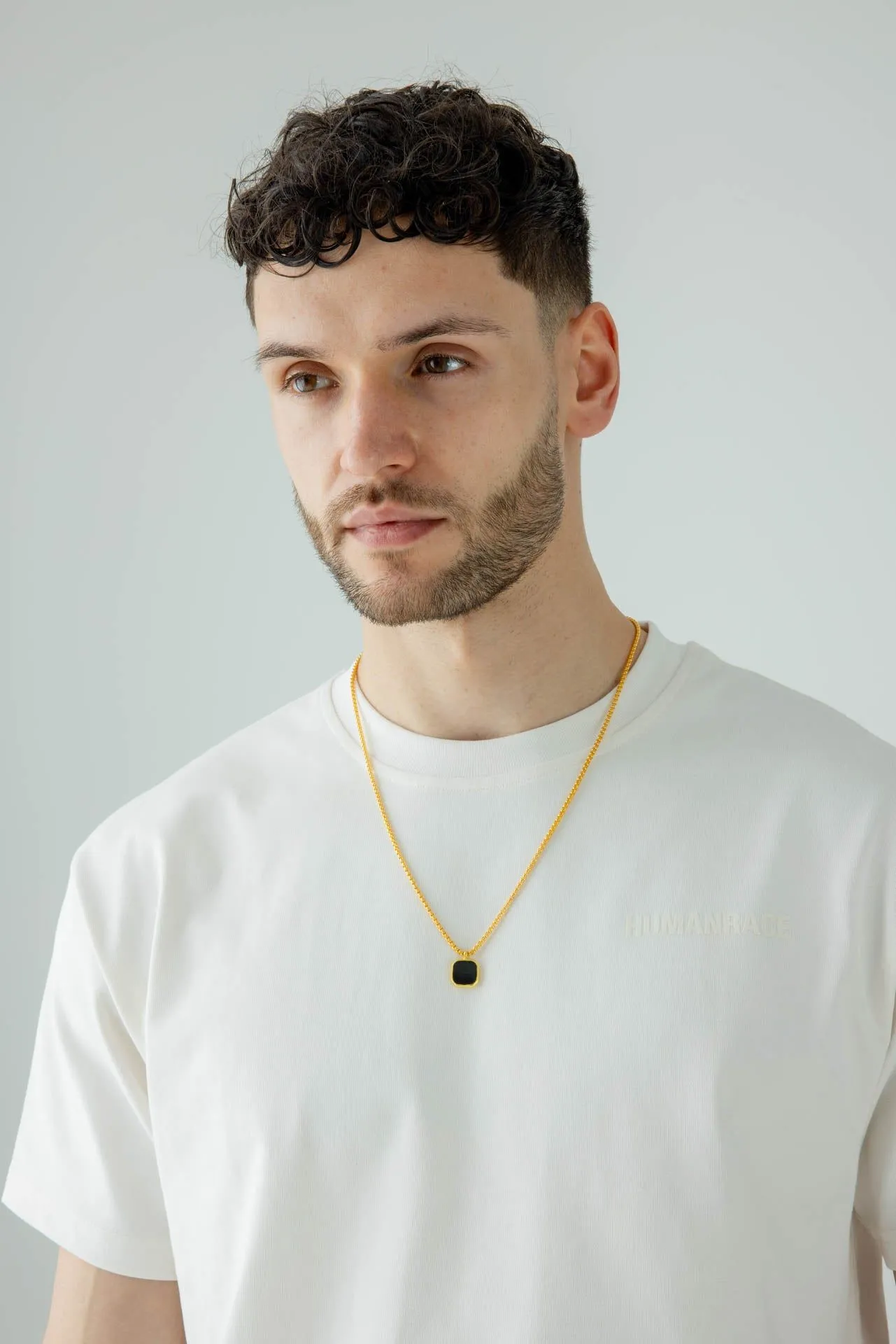 Gold Chain with Black Pendant